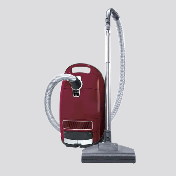 A red vacuum cleaner on a white background, available for services.